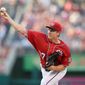 While he said he can &quot;gut it through,&quot; Washington Nationals pitcher Stephen Strasburg was put on the 15-day disabled list Monday with a sore right elbow. (Associated Press)