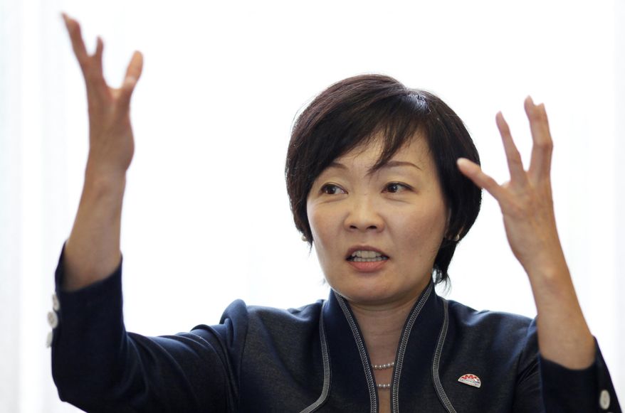 FILE - In this Sept. 4, 2014 file photo, Akie Abe, wife of Japanese Prime Minister Shinzo Abe, speaks during an interview with The Associated Press at the prime minister's official residence in Tokyo. Japan's first lady has visited Pearl Harbor for the first time to pay tribute to the victims of the Japanese attack 75 years ago. Abe said in her Facebook entry Monday, Aug. 22, 2016 that she laid flowers and prayed at the USS Arizona Memorial. "I offered flowers and a prayer," she wrote in a short message. (AP Photo/Eugene Hoshiko, File)