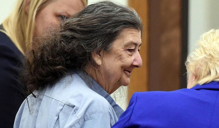 FILE - In this Sept. 8, 2014, file photo, Cathy Woods appears in Washoe District court in Reno, Nev. Woods, imprisoned for 35 years before being exonerated in a 1976 Reno murder case, is suing officials in Nevada and Louisiana on federal civil rights, malicious prosecution and conspiracy claims. (Andy Barron/The Reno Gazette-Journal via AP, File)