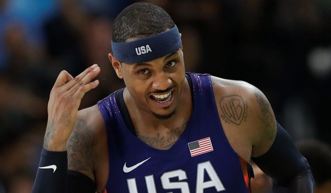 Carmelo Anthony is the U.S.&#x27; all-time leader in games, points and rebounds to go along with three team gold medals. (Associated Press)