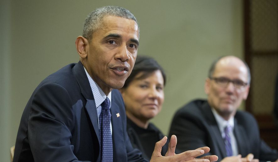 President Barack Obama, with Commerce Secretary Penny Pritzker, center, and Labor Secretary Thomas E. Perez, speaks during a meeting with members of his economic team in the Roosevelt Room of the White House in Washington, Friday, March 4, 2016. Obama spoke about U.S. employers adding 242,000 workers in February, driving another solid month for the resilient American job market. (AP Photo/Pablo Martinez Monsivais)