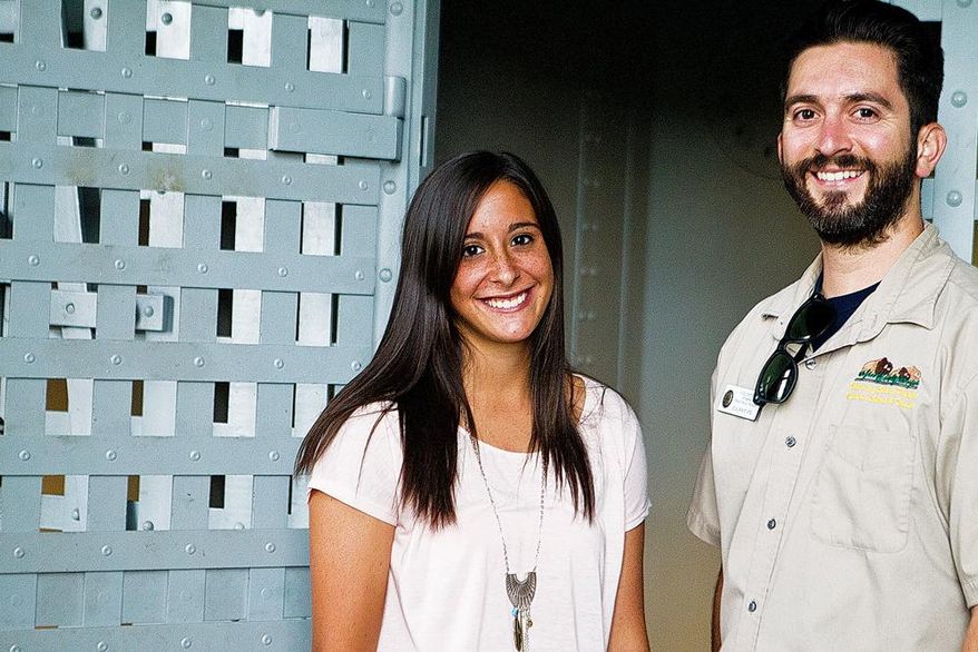 ADVANCE FOR THE WEEKEND OF AUG. 27-28 AND THEREAFTER - Lizzie Cardenas, left, and Curtis Leon, seen in an Aug. 3, 2016 photo, are both summer interns at the Wyoming Territorial Prison State Historic Site in Laramie, Wy. A handful of college students are getting firsthand history lessons at the Wyoming Territorial Prison State Historic Site, which launched a student internship program in the spring. (Shannon Broderick/Laramie Boomerang via AP)
