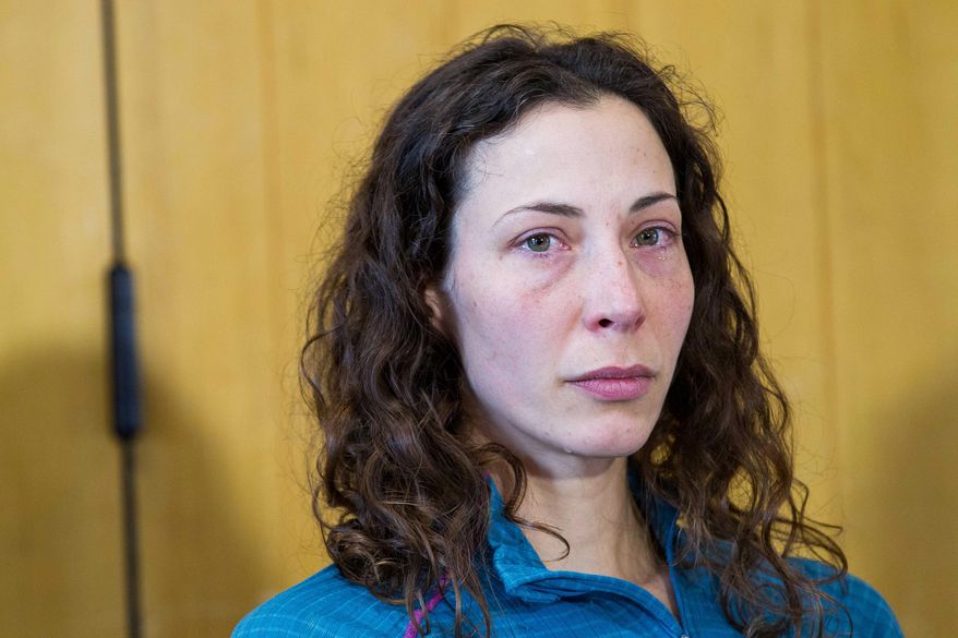 Czech tourist Pavlina Pizova attends a press conference at a police station in Queenstown, New Zealand, Friday, Aug. 26, 2016. Pizova, whose partner fell to his death, survived a harrowing month in the frozen New Zealand wilderness before being rescued, police said. (James Allan/New Zealand Herald via AP)