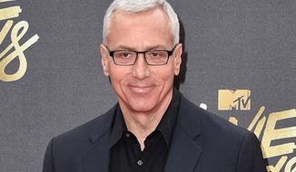 In this April 9, 2016 file photo, Drew Pinsky arrives at the MTV Movie Awards in Burbank, Calif. Pinsky&#39;s show &amp;quot;Dr. Drew,&amp;quot; has been canceled by the HLN network. His last episode will air on Sept. 22.  (Photo by Jordan Strauss/Invision/AP, File)