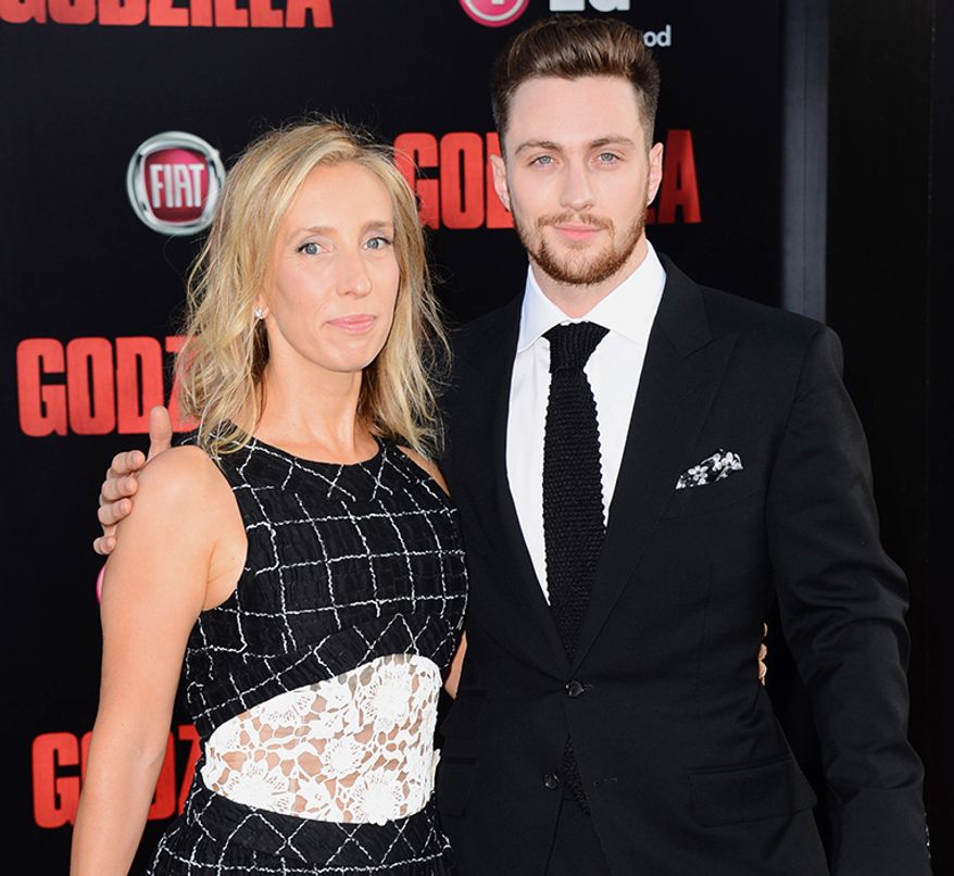 Sam Taylor-Wood and Aaron Johnson started dating when she was 41 and he was 18. The couple married in 2012. (Photo by Jordan Strauss/Invision/AP)