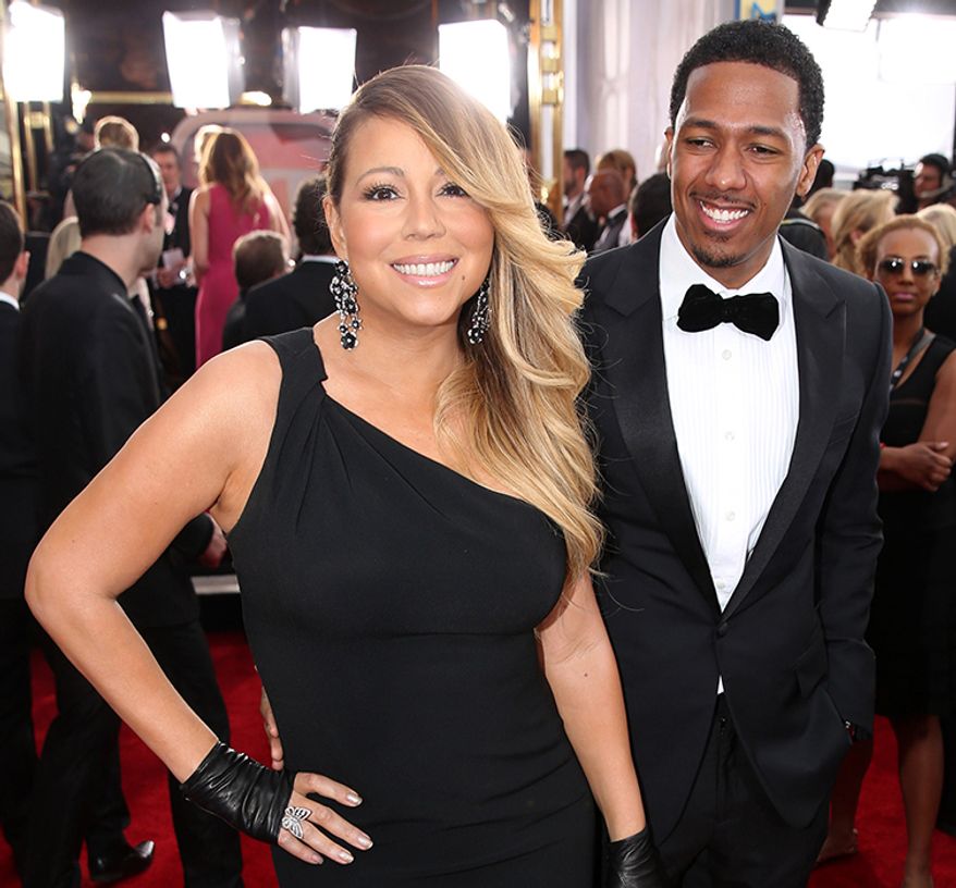 Mariah Carey met actor and comedian Nick Cannon while they shot her music video for her song &quot;Bye Bye&quot; on an island off the coast of Antigua. He was 27, she was 38. On April 30, 2008, Carey married Cannon in The Bahamas. In August 2014, Cannon confirmed he and Carey had separated a few months earlier. He filed for divorce on December 12, 2014. (AP Photo)