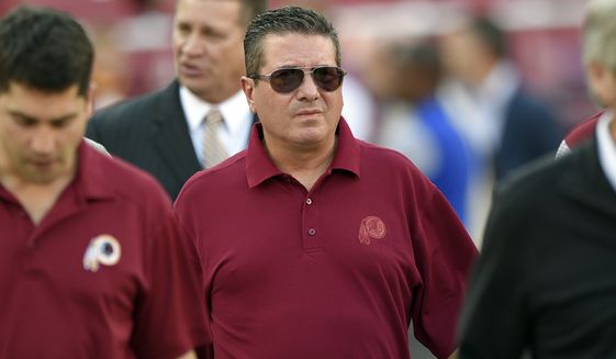 Washington Redskins owner Dan Snyder walks on the field before an NFL preseason football game against the Buffalo Bills, Friday, Aug. 26, 2016, in Landover, Md. (AP Photo/Nick Wass)