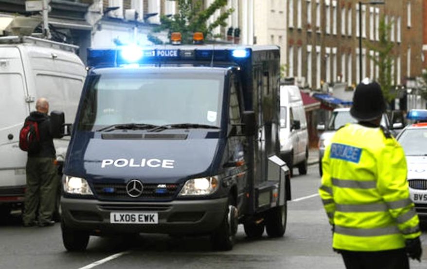 A counterterrorism operation that involved calling in a bomb squad netted five suspects in England on Friday, Aug. 26, 2016. (Associated Press) ** FILE **