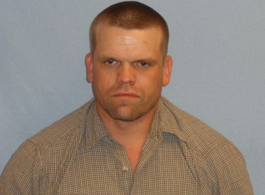 This undated photo provided by the Richland County Sheriff's office shows Raymond Hansen, who is charged with fatally shooting a 63-year-old construction worker at a job site in Sidney, Mont., near the North Dakota border. (Multnomah County Sheriff's Office via AP)