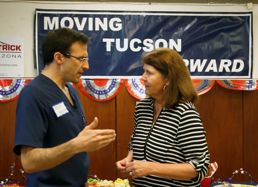 Rep. Ann Kirkpatrick is likely to be the Democratic rival to Sen. John McCain in Arizona. Matt Heinz, a practicing doctor, is vying for a congressional nomination in the primary on Tuesday. (Associated Press)