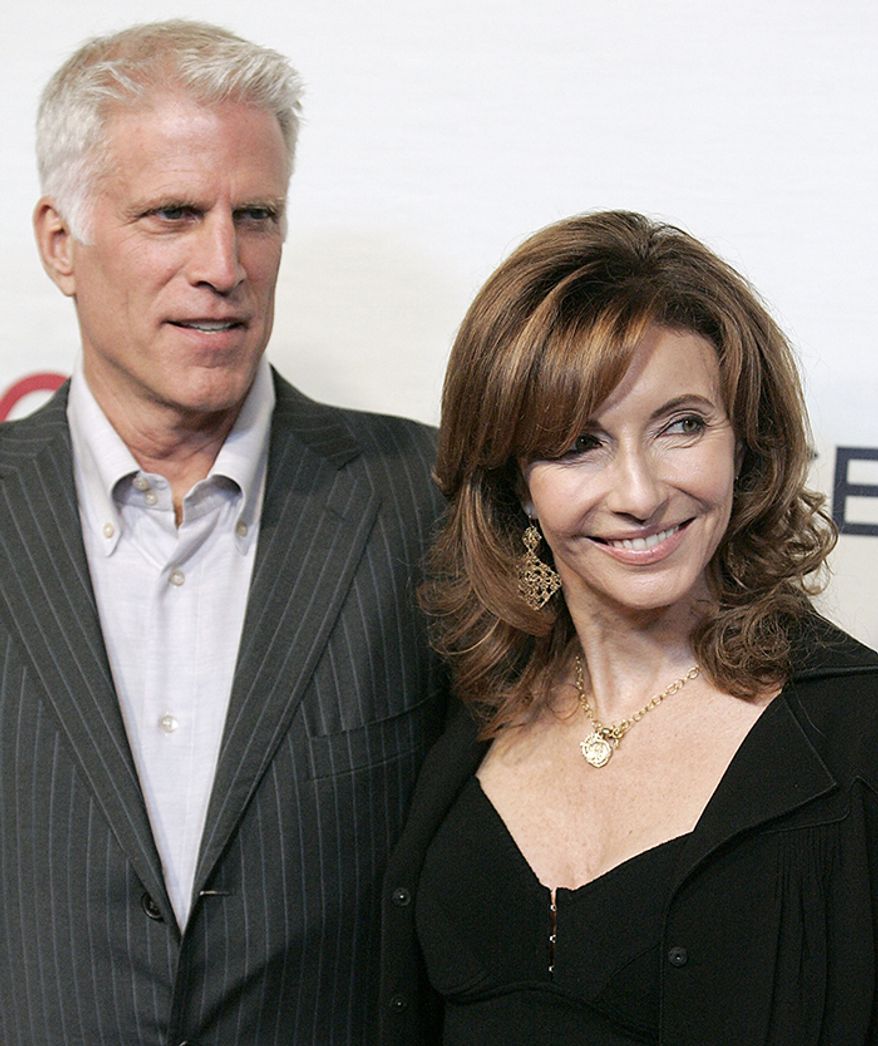 Ted Danson married actress Mary Steenburgen, on October 7, 1995. The couple met on the set of the movie Pontiac Moon in 1993, and became the stepfather to Steenburgen's daughter Lilly and son Charlie McDowell from her previous marriage to actor Malcolm McDowell. (AP Photo/Dan Steinberg)