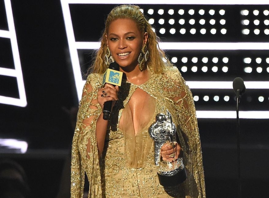 Beyonce accepts the award for best female video for “Hold Up” at the MTV Video Music Awards at Madison Square Garden on Sunday, Aug. 28, 2016, in New York. (Photo by Charles Sykes/Invision/AP)