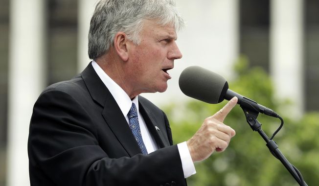 FILE - In this Thursday, Aug. 25, 2016 file photo, the Rev. Franklin Graham speaks during an election prayer rally outside the state Capitol in Albany, N.Y. Graham is scheduled to hold a mass prayer rally as part of a 50-state tour to urge evangelicals to vote, Tuesday, Aug. 30, 2016, on Boston Common. (AP Photo/Mike Groll, File)