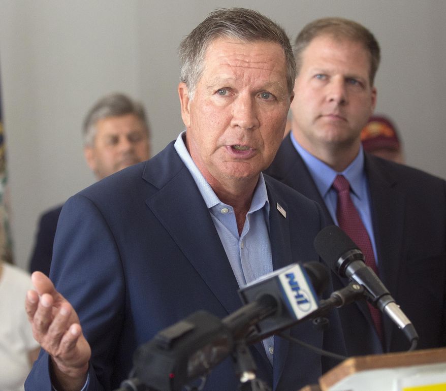 Former Republican presidential candidate Ohio Gov. John Kasich, left, endorses Chris Sununu, right, for New Hampshire's governor during a news conference Monday, Aug. 29, 2016, in Concord, N.H. (AP Photo/Jim Cole) ** FILE **