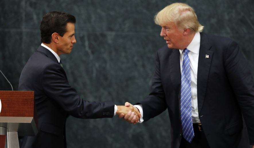 Mexico President Enrique Pena Nieto and Republican presidential nominee Donald Trump shake hands after a joint statement at Los Pinos, the presidential official residence, in Mexico City, Wednesday, Aug. 31, 2016. Trump is calling his surprise visit to Mexico City Wednesday a &#39;great honor.&#39;  The Republican presidential nominee said after meeting with Pena Nieto that the pair had a substantive, direct and constructive exchange of ideas.(AP Photo/Dario Lopez-Mills)