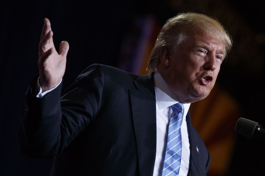 Republican presidential candidate Donald Trump delivers an immigration policy speech during a campaign rally at the Phoenix Convention Center, Wednesday, Aug. 31, 2016, in Phoenix. (AP Photo/Evan Vucci)
