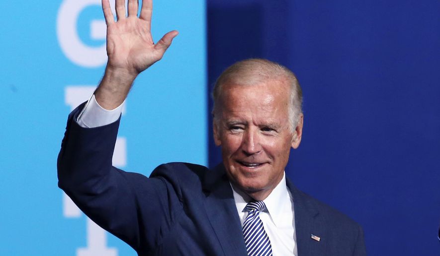 Vice President Joseph R. Biden on Thursday touted the qualifications of Democratic presidential nominee Hillary Clinton, but refused to defend her family foundation. (Associated Press)