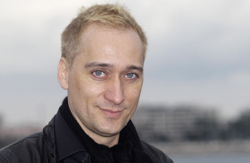 FILE - In this Jan. 30, 2012 file photo, German Electronic Dance Music DJ and record producer Paul Van Dyk poses at the 46th MIDEM (International record music publishing and video music market) in Cannes, southern France. Van Dyk's website and Twitter accounted were hacked and racist messages were posted. A spokesman for the DJ says he did not post any racist messages Thursday, Sept. 1, 2016, on Twitter. (AP Photo/Lionel Cironneau, File)