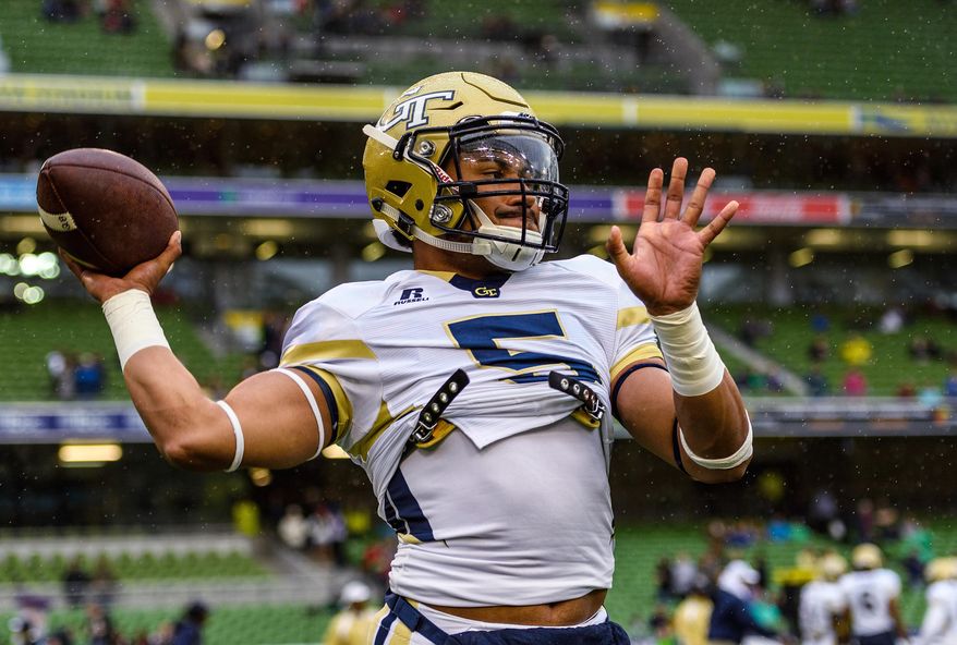 In this photo released by Georgia Tech, Georgia Tech Quarterback Justin Thomas (5) warms up before the first half of an NCAA football game between Boston College and Georgia Tech, Saturday, Sept. 3, 2016, in Dublin, Ireland. (Danny Karnik/Georgia Tech via AP)
