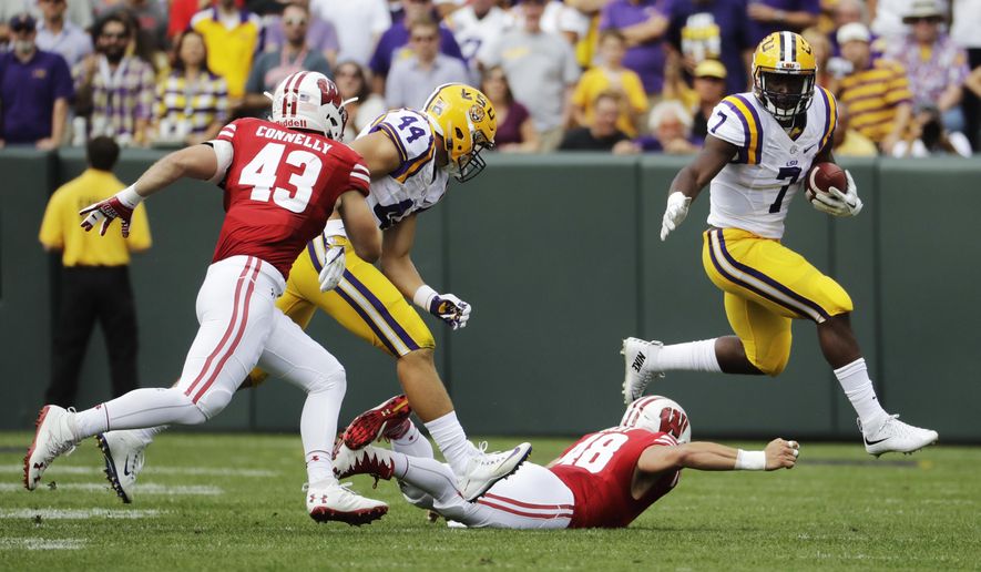 LSU's Leonard Fournette runs during the first half of an NCAA college football game against Wisconsin Saturday, Sept. 3, 2016, in Green Bay, Wis. (AP Photo/Morry Gash)