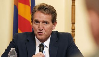 Sen. Jeff Flake of Arizona, one of Donald Trump&#39;s staunchest Republican critics, warned that the state is &quot;up for grabs&quot; and advised members of his party to distance themselves from the real estate mogul. (Associated Press)