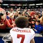 San Francisco 49ers quarterback Colin Kaepernick has been getting support in his protest from fans, other athletes and even President Obama. (Associated Press)