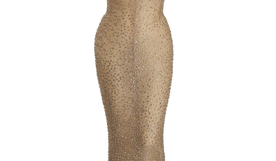 This undated photo provided by Julien's Auctions shows the flesh-colored dress Marilyn Monroe wore during her rendition of "Happy Birthday" to President John F. Kennedy. Julien’s Auctions is offering the sequined stunner in Los Angeles on Nov. 17, 2016. (Julien's Auctions via AP)