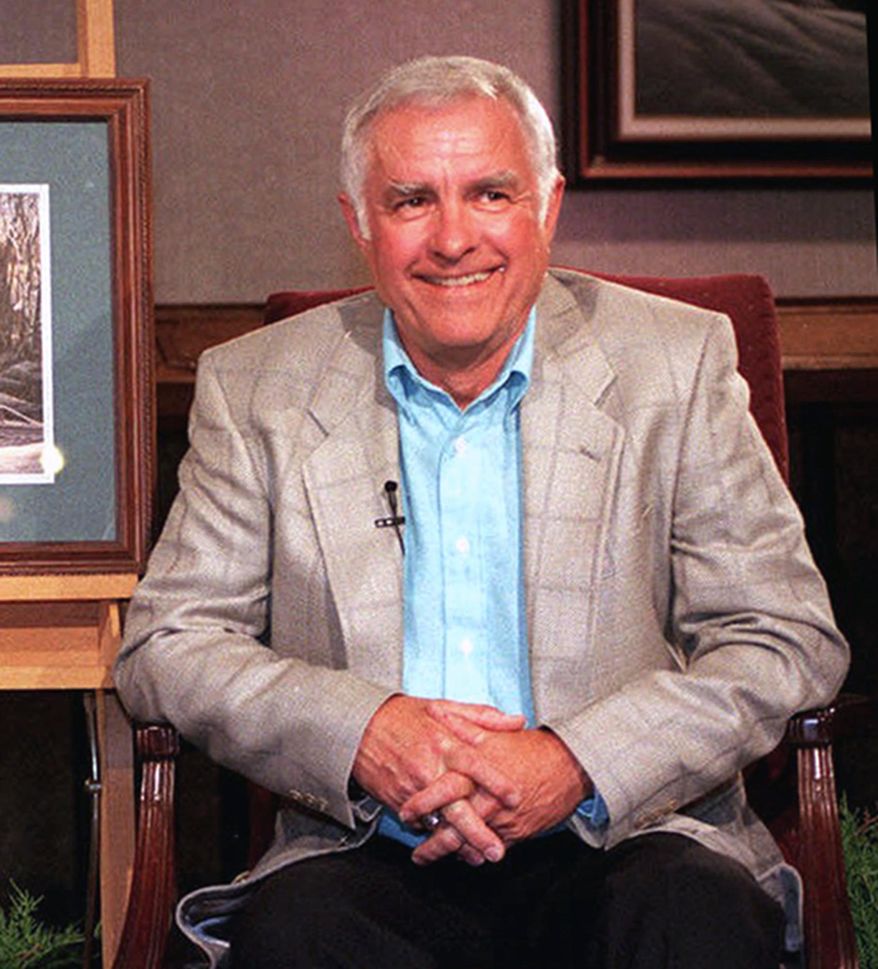 FILE - In this June 8, 1999, file photo, artist Terry Redlin is seen at his gallery in Watertown, S.D. The Redlin Art Center will unveil the final painting by the late outdoors artist on Friday, Sept. 9, 2016 and leave it up for viewing until Sept. 19. Redlin is famous for his paintings of wildlife and outdoors scenes. He died in April at the age of 78. (Val Hoeppner/The Argus Leader via AP, File)