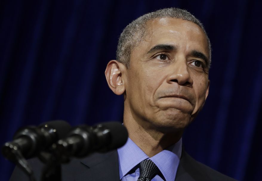 U.S. President Barack Obama pauses as he speaks during a news conference at the Landmark Mekong Riverside Hotel in Vientiane, Laos, Thursday, Sept. 8, 2016, after attending the ASEAN Summit. (AP Photo/Carolyn Kaster)