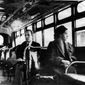 This an undated photo shows Rosa Parks riding on the Montgomery Area Transit System bus. Parks refused to give up her seat on a Montgomery bus on Dec. 1, 1955, and ignited the boycott that led to a federal court ruling against segregation in public transportation. (Associated Press)