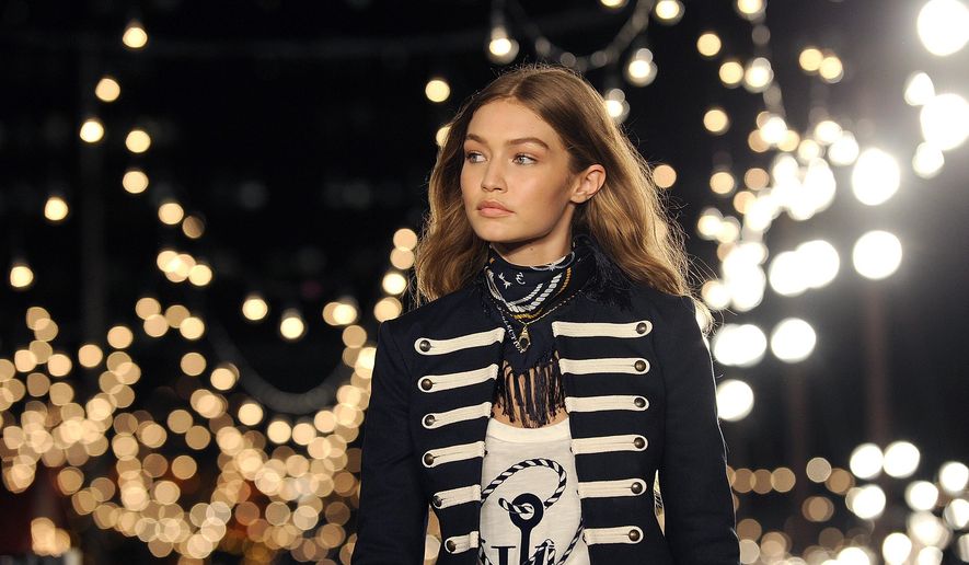 Gigi Hadid models the Tommy Hilfiger Fall 2016 collection and her TommyXGigi capsule during Fashion Week in New York, Friday, Sept. 9, 2016. (AP Photo/Diane Bondareff)