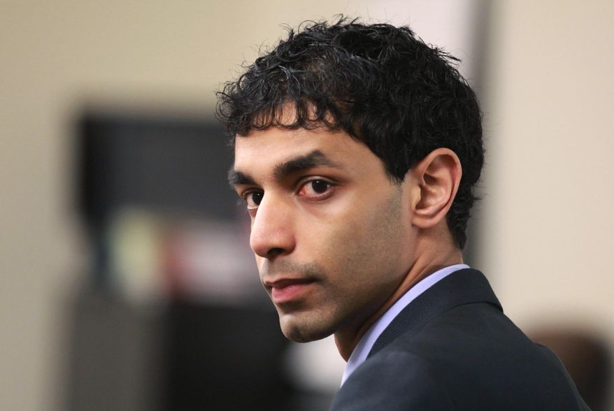 FILE – In this March 2, 2012, file photo, Dharun Ravi waits for his trial to begin at the Middlesex County Courthouse in New Brunswick, N.J. In a Friday, Sept. 9, 2016, ruling, a New Jersey appeals court threw out the 15-count conviction of the former Rutgers University student, whose roommate Tyler Clementi killed himself in 2010 after being captured on a webcam kissing another man. (John Munson/The Star-Ledger via AP, Pool, File)