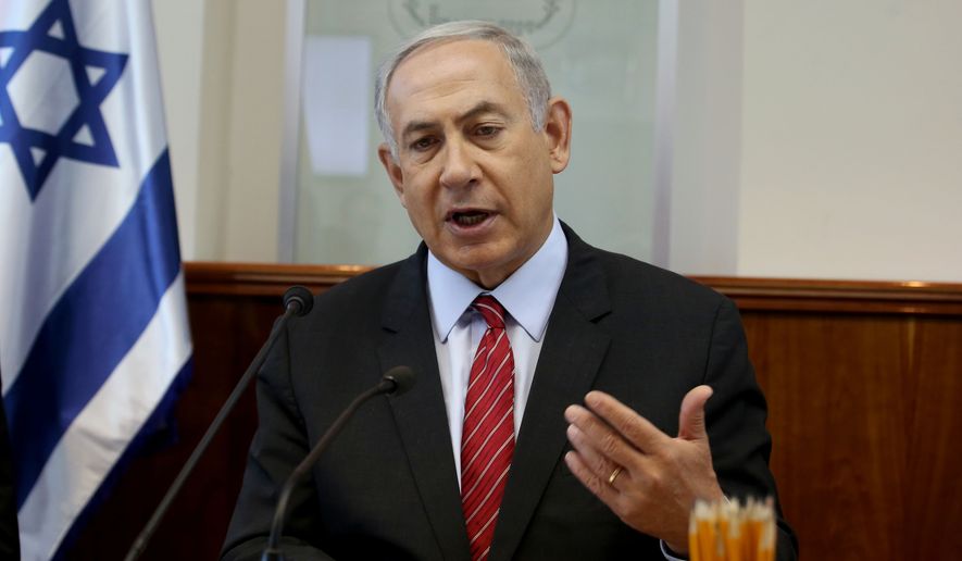 Israeli Prime Minister Benjamin Netanyahu gestures as he opens the weekly cabinet meeting at his Jerusalem office on Sunday, Sept. 11, 2016. (Gali Tibbon, Pool via AP) ** FILE **