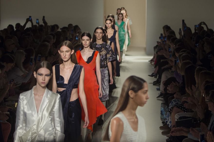 The Victoria Beckham Spring 2017 collection is modeled during Fashion Week in New York, Sunday, Sept. 11, 2016. (AP Photo/Andres Kudacki)
