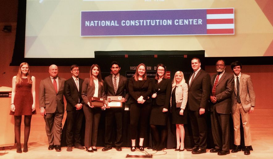 Julie Silverbrook (fourth from right), executive director of The Constitutional Sources Project, and Josh Blackman, president of Harlan Institute (third from right), stand with winners and judges of ConSource-Harlan Institute Virtual Supreme Court Competition in April 2016. The students had to write appellate briefs on an affirmative-action case, and argue against other student teams before a panel of attorneys. Image courtesy of ConSource.
