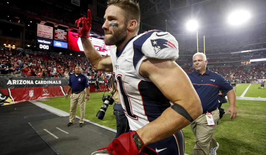 New England Patriots wide receiver Julian Edelman (11) leaves the field after an NFL football game against the Arizona Cardinals, Sunday, Sept. 11, 2016, in Glendale, Ariz. The Patrios won 23-21. (AP Photo/Ross D. Franklin)