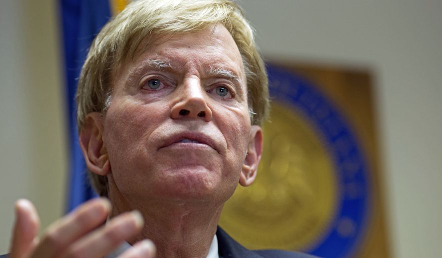 In this July 22, 2016 file photo, former Ku Klux Klan leader David Duke talks to the media at the Louisiana Secretary of State&#39;s office in Baton Rouge, La.  (AP Photo/Max Becherer, File)