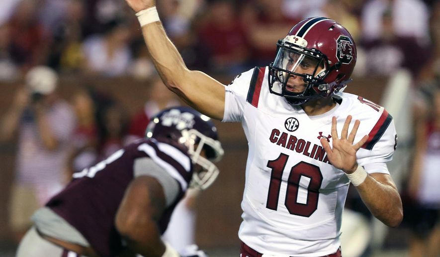 FILE - In this Sept. 10, 2016, file photo, South Carolina quarterback Perry Orth (10) throws the ball during the first half of their NCAA college football game against Mississippi State in Starkville, Miss., Saturday, Sept. 10, 2016. Senior Perry Orth has started the first two games. But freshman Brandon McIlwain may get the chance against fired-up East Carolina on Saturday. (AP Photo/Jim Lytle, File)
