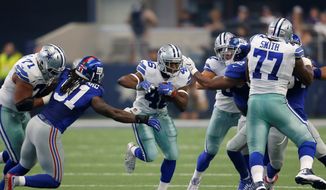 Dallas Cowboys running back Alfred Morris (46) runs the ball as New York Giants linebacker Kelvin Sheppard (91) attempts the stop during an NFL football game, Sunday Sept. 11,  2016, in Arlington, Texas. (AP Photo/Roger Steinman)