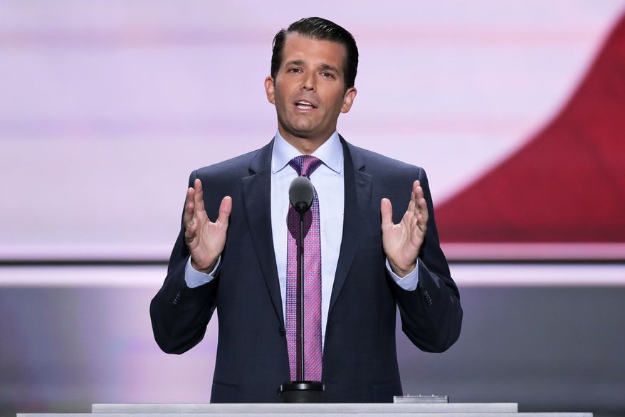 FILE - In this July 19, 2016 file photo, Donald Trump, Jr., son of Republican Presidential Candidate Donald Trump, lifts his fist after speaking at the Republican National Convention in Cleveland. The Anti-Defamation League is calling for Donald Trump's oldest son to apologize for making what appeared to be a Holocaust-themed joke. (AP Photo/J. Scott Applewhite, File)
