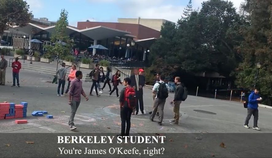 James O'Keefe at the University of California, Berkeley, holds a cut-out of GOP presidential nominee Donald Trump as students engage him on campus. (Source: YouTube Channel: Project Veritas Action)