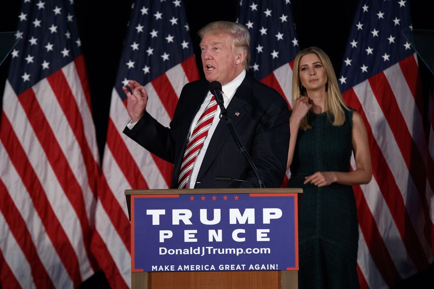 Ivanka Trump, right, looks on as her father Republican presidential candidate Donald Trump delivers a policy speech on child care, Tuesday, Sept. 13, 2016, in Aston, Penn. (AP Photo/Evan Vucci)