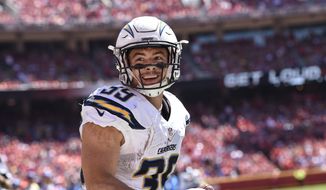 San Diego Chargers running back Danny Woodhead (39) celebrates after a touchdown against the Kansas City Chiefs during the first half of their NFL football game in Kansas City, Mo., Sunday, Sept. 11, 2016. (AP Photo/Reed Hoffmann)