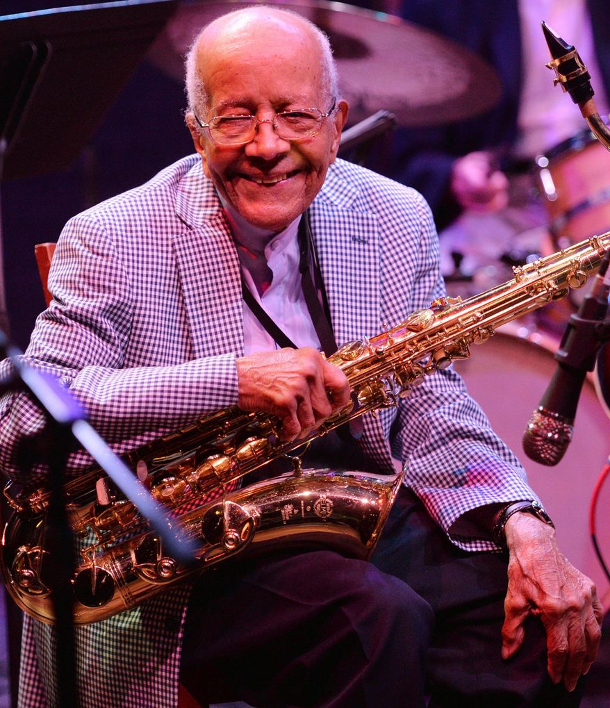 ADVANCE FOR MONDAY SEPT. 19, 2016 AT 12:01 A.M. CDT AND THEREAFTER In this Tuesday, Aug. 16, 2016 photo, St. Paul saxophonist, Irv Williams, smiles as he reminiscences at the Dakota Jazz Club in Minneapolis. Williams was celebrating his 97th birthday. Raised in Cincinnati and Little Rock, Arkansas, Williams started playing music at the age of 6. He took up the saxophone at 12, when he was old enough to join the school band. "I liked that you had to be creative to play jazz music," he said. (John Autey/Pioneer Press via AP)