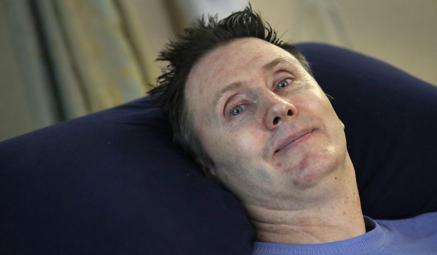 This Sept. 1, 2016 photo shows John Reese at Manor Care Health Services in Appleton, Wis., after recovering from a recent surgery. Fifteen years after a horrific diving incident, the paralyzed former Appleton firefighter has been in assisted living ever since, and has made peace with the reality that he’ll never again enjoy the level of privacy most people have. (Dan Powers/The Post-Crescent via AP)