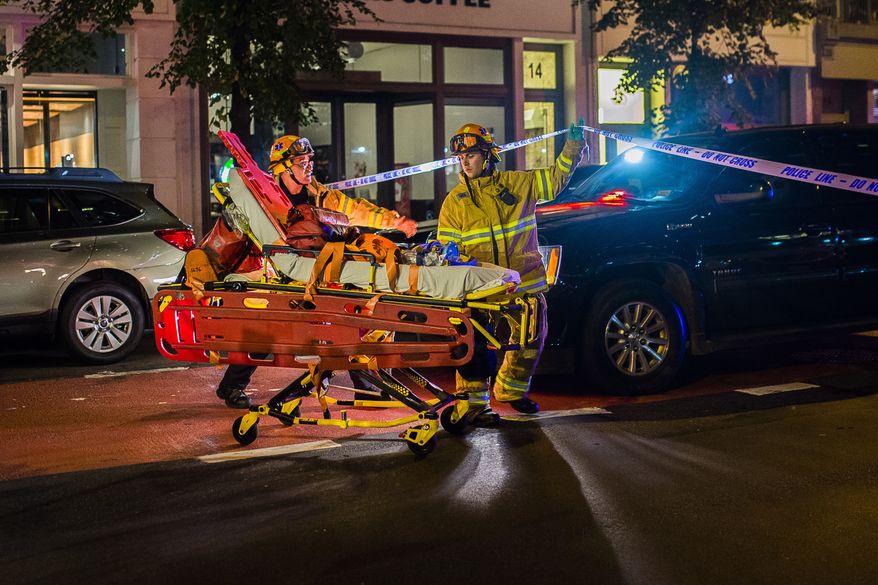Firefighters arrive at the scene of an apparent explosion in Manhattan's Chelsea neighborhood, in New York, Saturday, Sept. 17, 2016. A law enforcement official tells The Associated Press that an explosion in the Chelsea neighborhood appears to have come from a construction toolbox in front of a building. The official spoke on condition of anonymity because the person wasn't authorized to speak about an ongoing investigation. Police say 26 people have sustained minor injuries in the explosion on West 23rd Street. (AP Photo/Andres Kudacki)