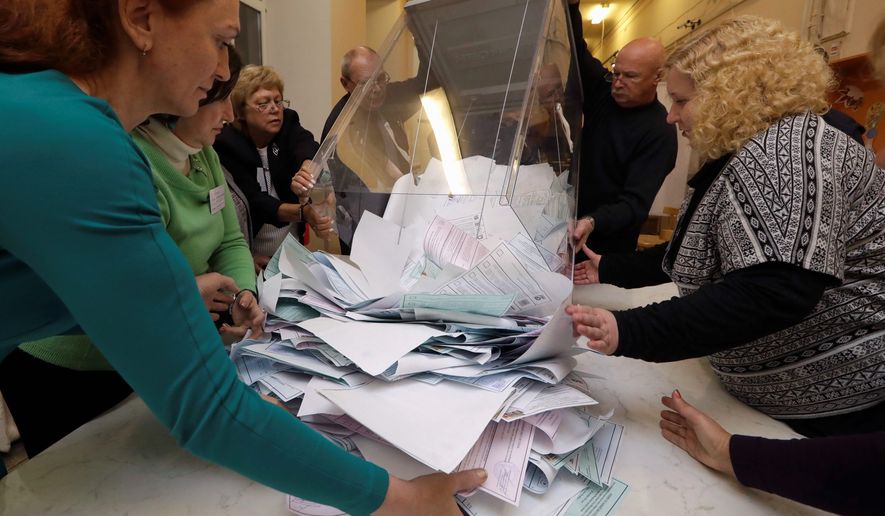 Russian ballot boxes were emptier than usual on Sunday as voter apathy and disillusionment meant embarrassingly low turnouts. (Associated Press)