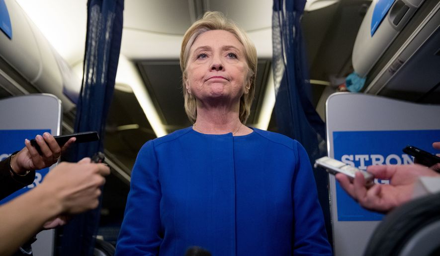 Democratic presidential candidate Hillary Clinton pauses while she gives remarks on the explosion in Manhattan&#39;s Chelsea neighborhood onboard her campaign plane at Westchester County Airport, in White Plains, N.Y., Saturday, Sept. 17, 2016. (AP Photo/Andrew Harnik)