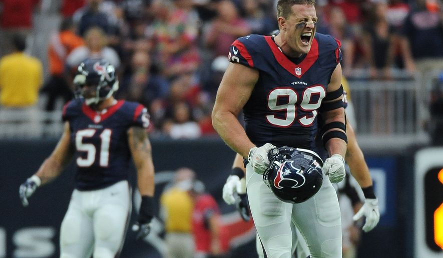 Houston Texans defensive end J.J. Watt (99) celebrates after he sacked Kansas City Chiefs quarterback Alex Smith during the first half of an NFL football game Sunday, Sept. 18, 2016, in Houston. (AP Photo/George Bridges)
