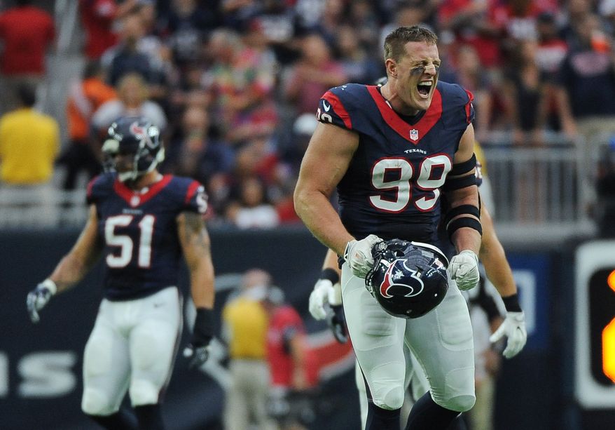 Houston Texans defensive end J.J. Watt (99) celebrates after he sacked Kansas City Chiefs quarterback Alex Smith during the first half of an NFL football game Sunday, Sept. 18, 2016, in Houston. (AP Photo/George Bridges)